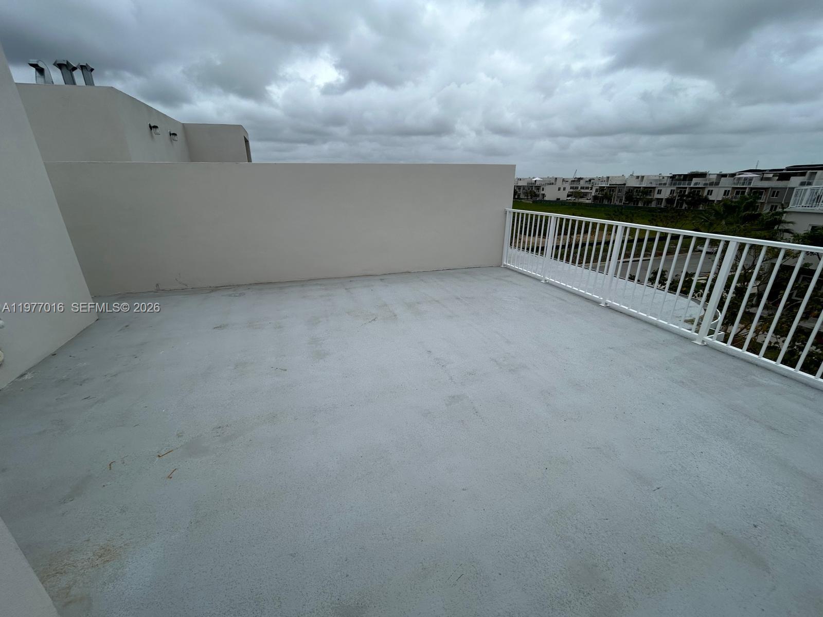 25814 Southwest 144th Court, Unit 2 Homestead, FL 33032 - Photo 22 of 25 a view of balcony with city view