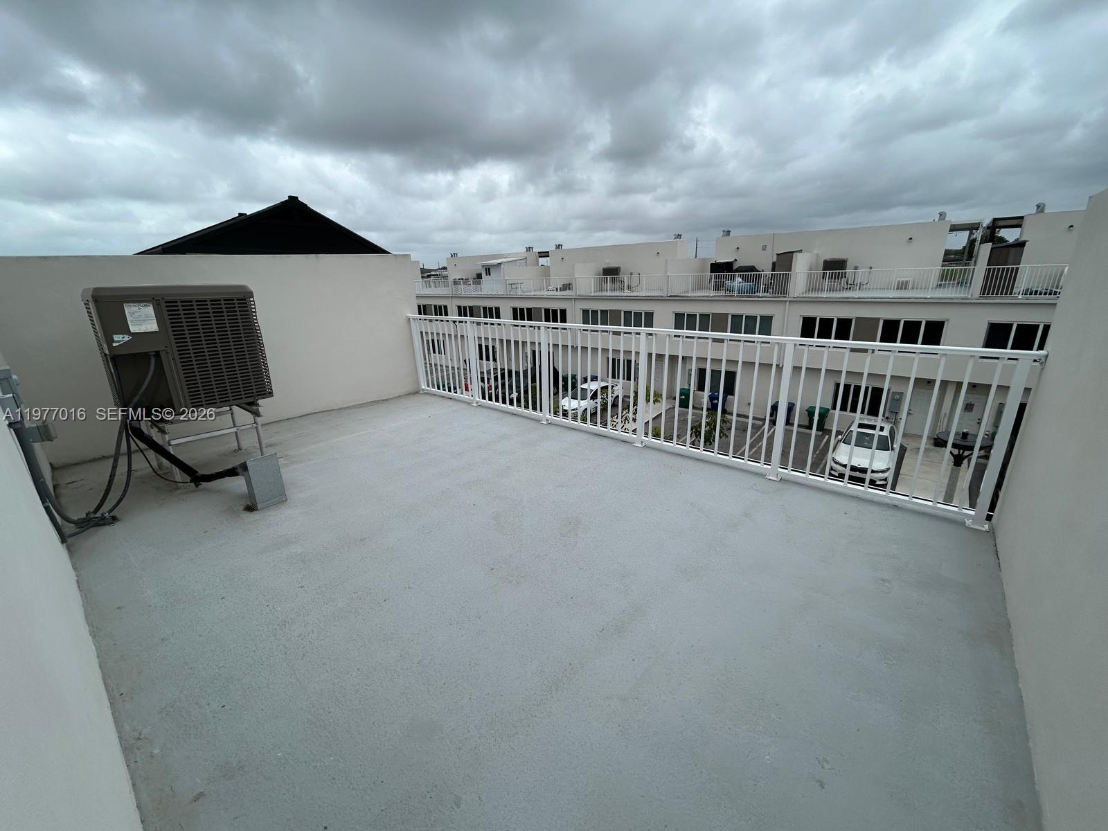 25814 Southwest 144th Court, Unit 2 Homestead, FL 33032 - Photo 24 of 25 a view of balcony with furniture