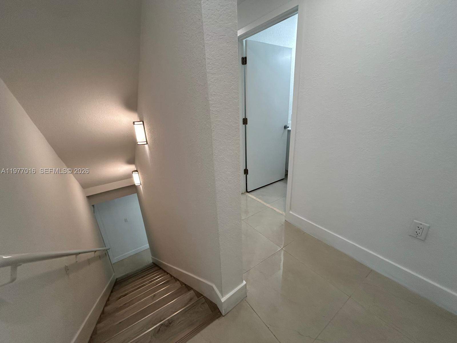 25814 Southwest 144th Court, Unit 2 Homestead, FL 33032 - Photo 10 of 25 a view of an empty walk in closet