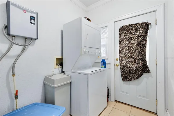 a bathroom with a sink toilet and mirror