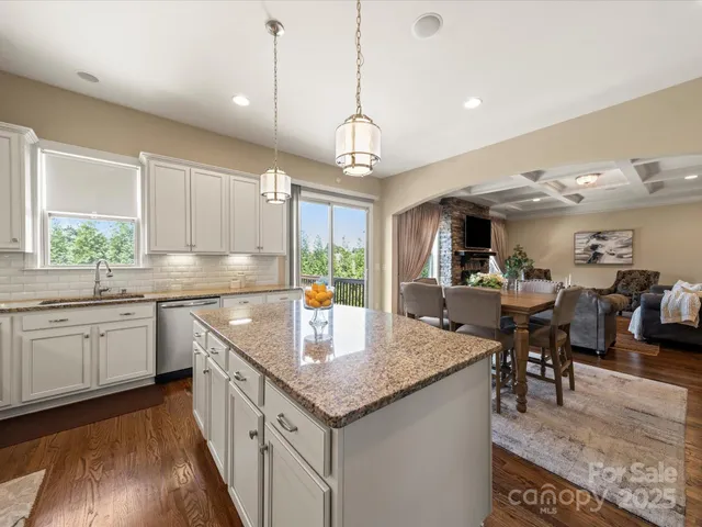 a bedroom with a bed and a night stand