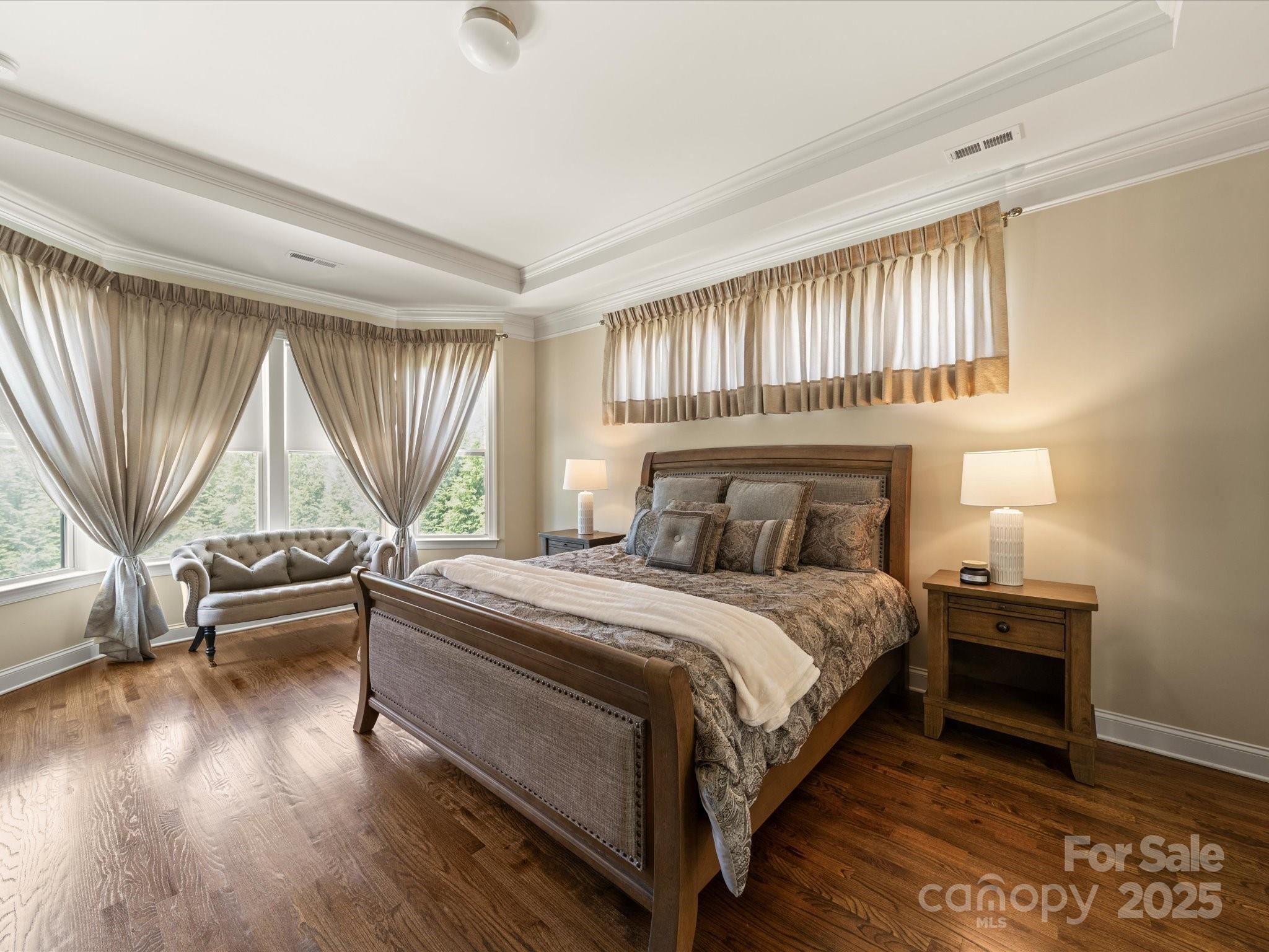 11632 Barnard Street Mint Hill, NC 28227 - Photo 13 of 39 a bedroom with a bed and a night stand