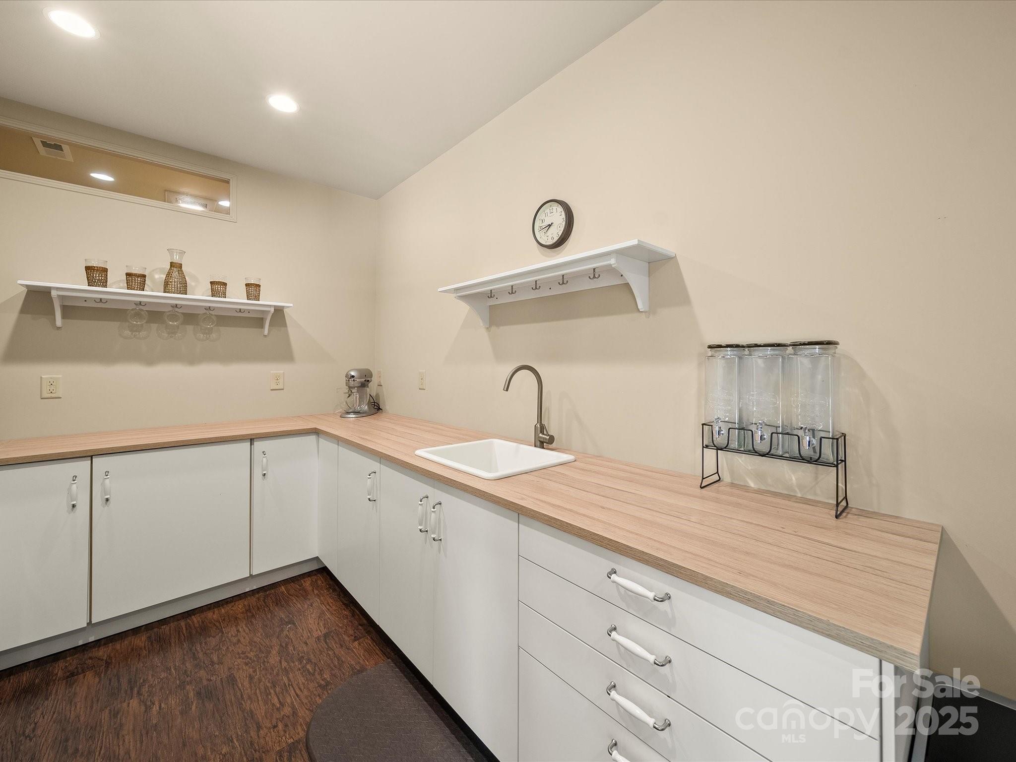 11632 Barnard Street Mint Hill, NC 28227 - Photo 29 of 39 a spacious bathroom with a sink and a mirror