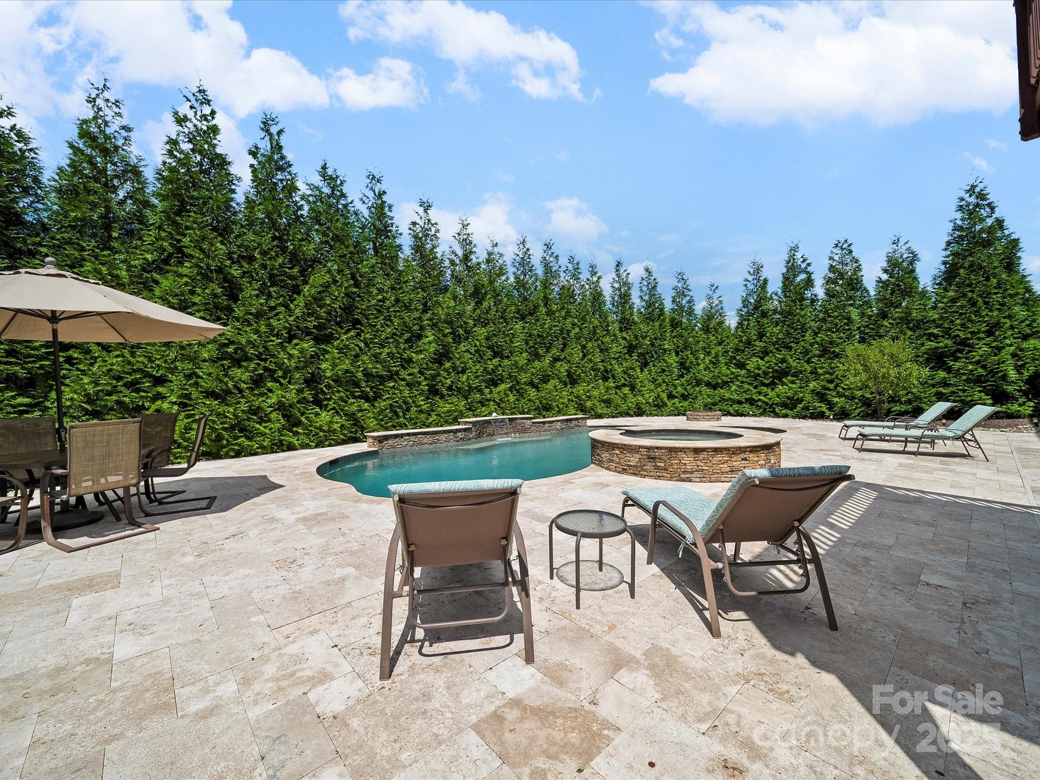 11632 Barnard Street Mint Hill, NC 28227 - Photo 33 of 39 a outdoor sitting area with furniture and a bench