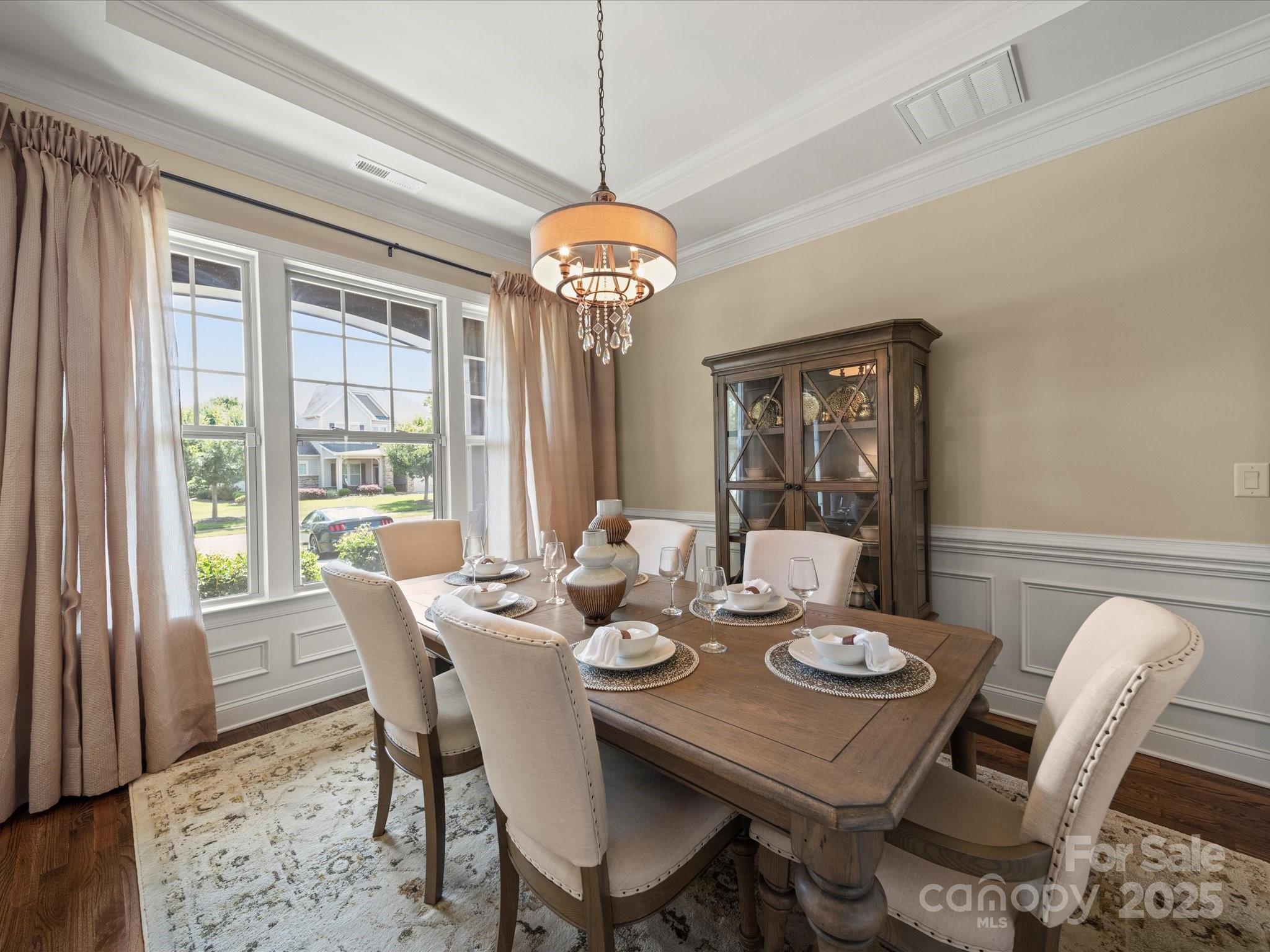 11632 Barnard Street Mint Hill, NC 28227 - Photo 4 of 39 a view of a dining room with furniture window and wooden floor