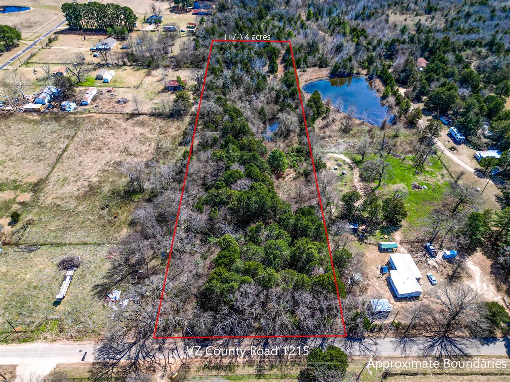 1215 County Road 1215 Canton, TX 75103 - Photo 5 of 8 an aerial view of residential houses with outdoor space
