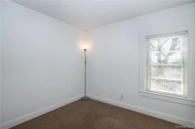 an empty room with window