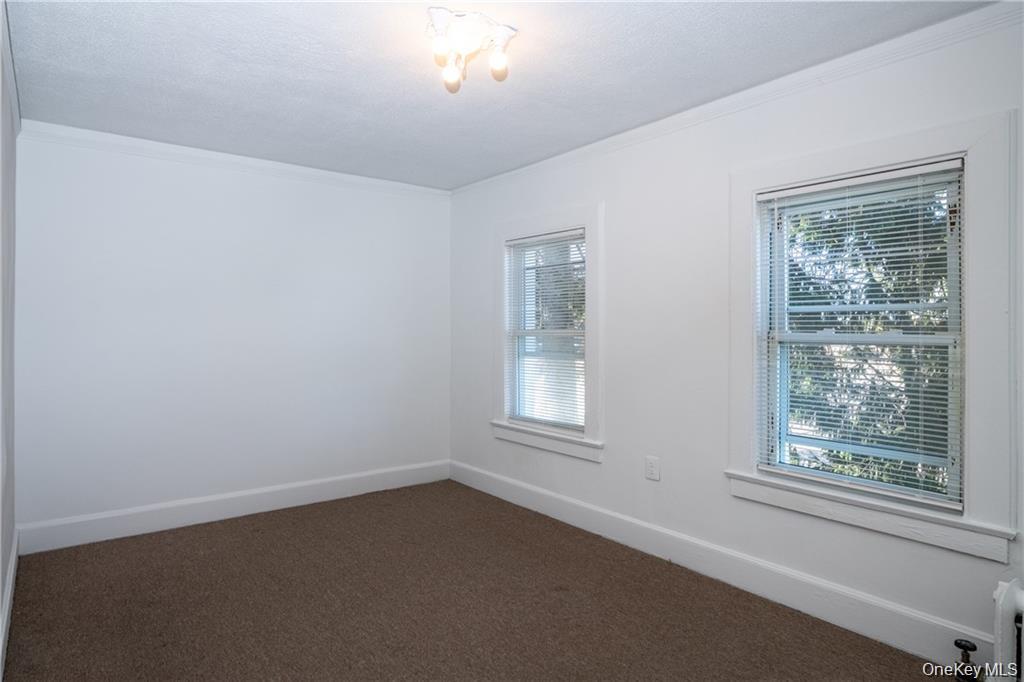 21 Wallace Street, Unit 2 Tuckahoe, NY 10707 - Photo 13 of 19 an empty room with a window