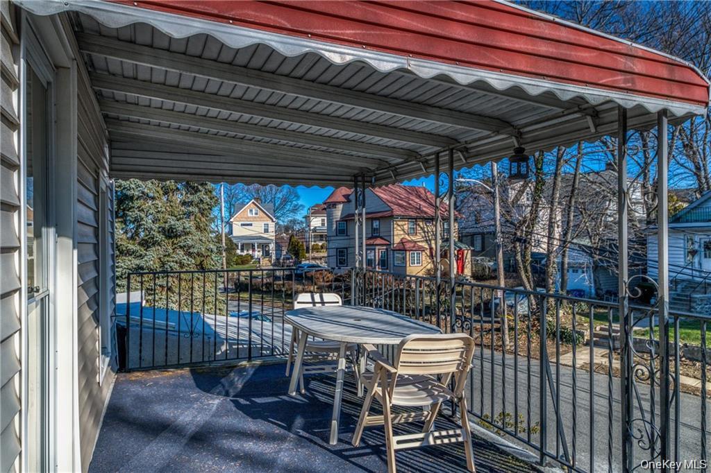 21 Wallace Street, Unit 2 Tuckahoe, NY 10707 - Photo 18 of 19 a view of chairs and table in patio