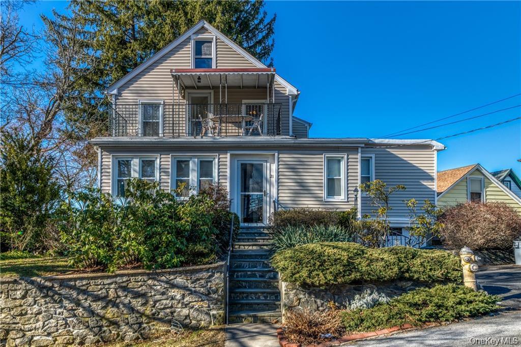 21 Wallace Street, Unit 2 Tuckahoe, NY 10707 - Photo 2 of 19 a front view of a house with a yard
