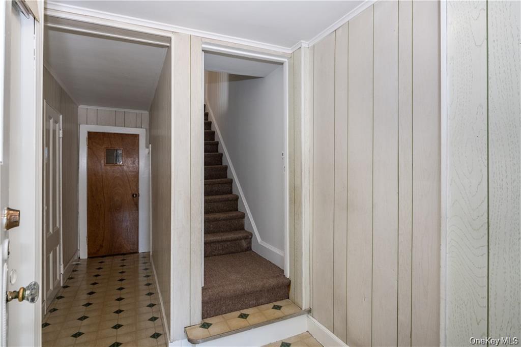 21 Wallace Street, Unit 2 Tuckahoe, NY 10707 - Photo 4 of 19 a view of a hallway with wooden floor and entryway