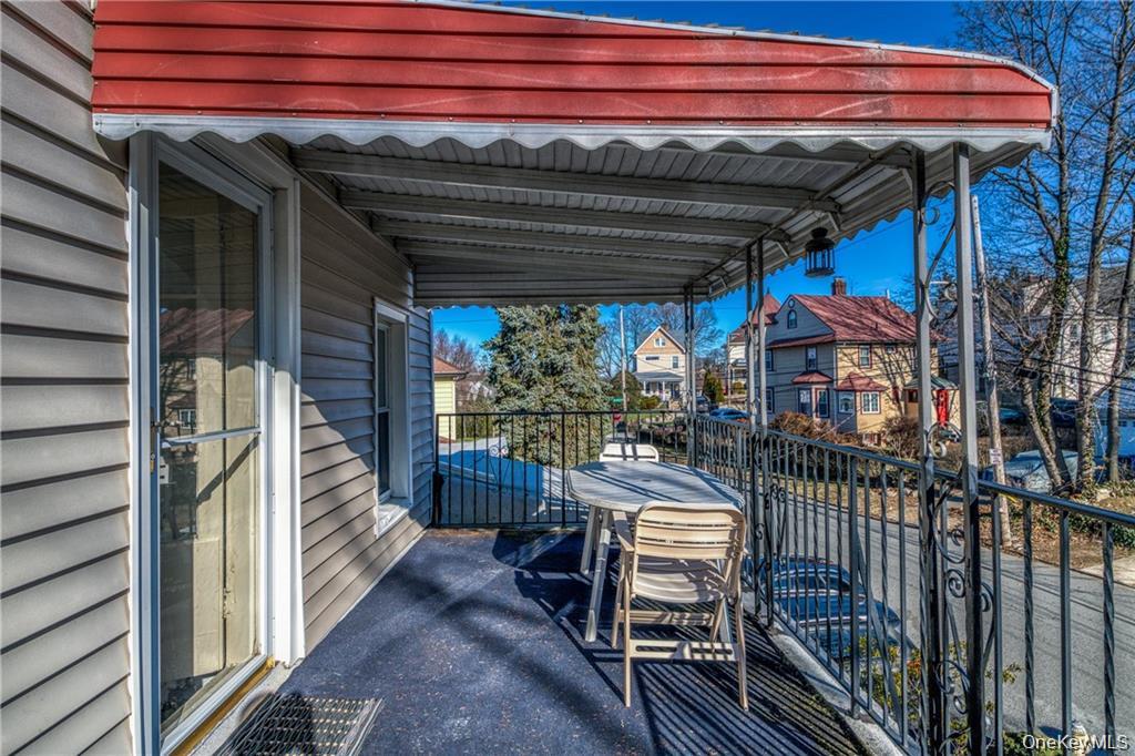 21 Wallace Street, Unit 2 Tuckahoe, NY 10707 - Photo 5 of 19 a view of a patio with table and chairs