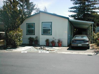 34 Bluejay Drive, Unit 34 Santa Rosa, CA 95409 - Photo 1 of 5 a car parked in front of a house