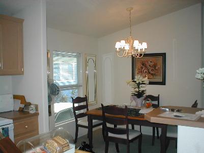34 Bluejay Drive, Unit 34 Santa Rosa, CA 95409 - Photo 3 of 5 a view of a dining room with furniture and chandelier