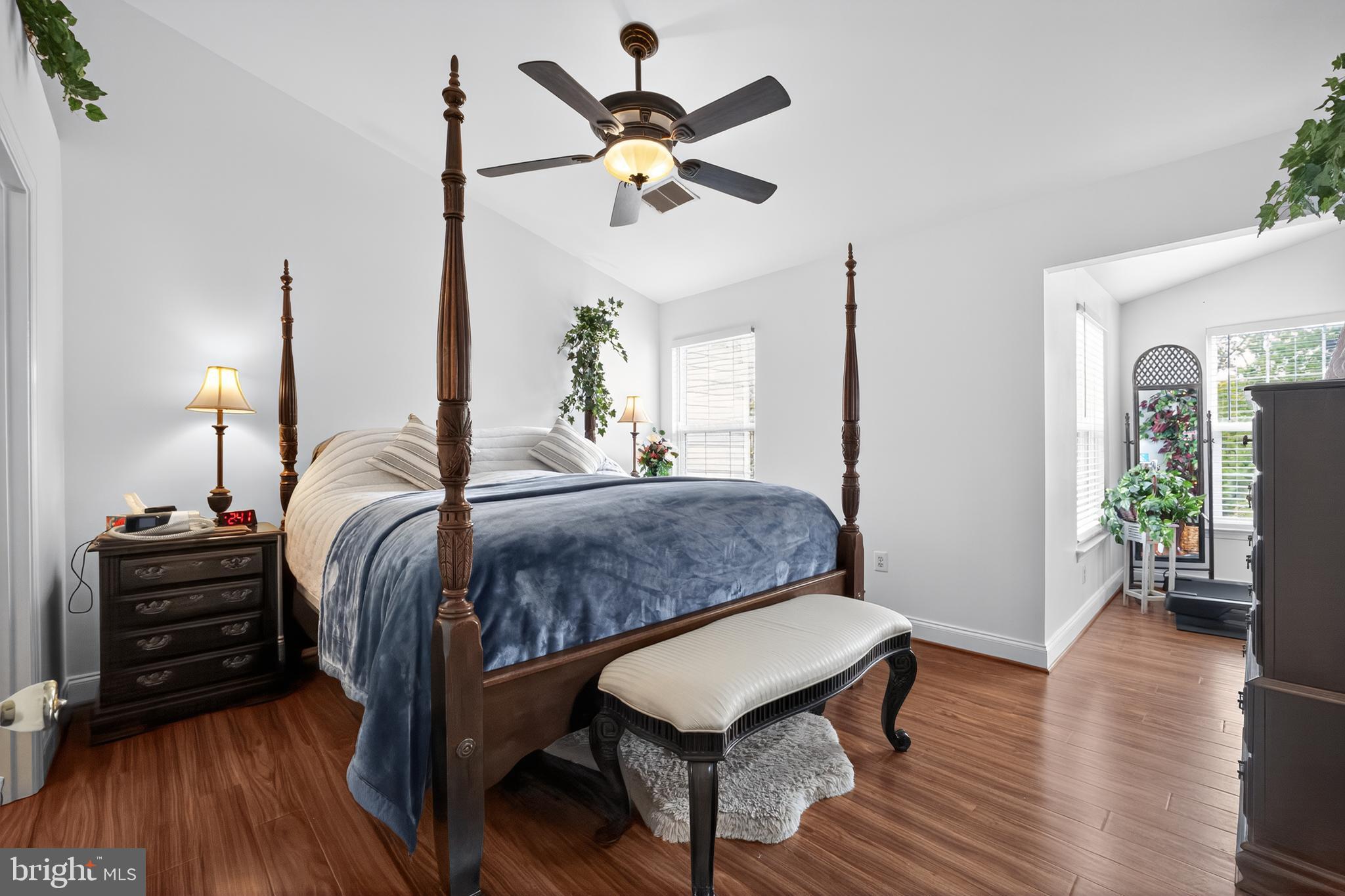 8768 Dunstable Loop Bristow, VA 20136 - Photo 13 of 47 a bedroom with a bed window and a ceiling fan