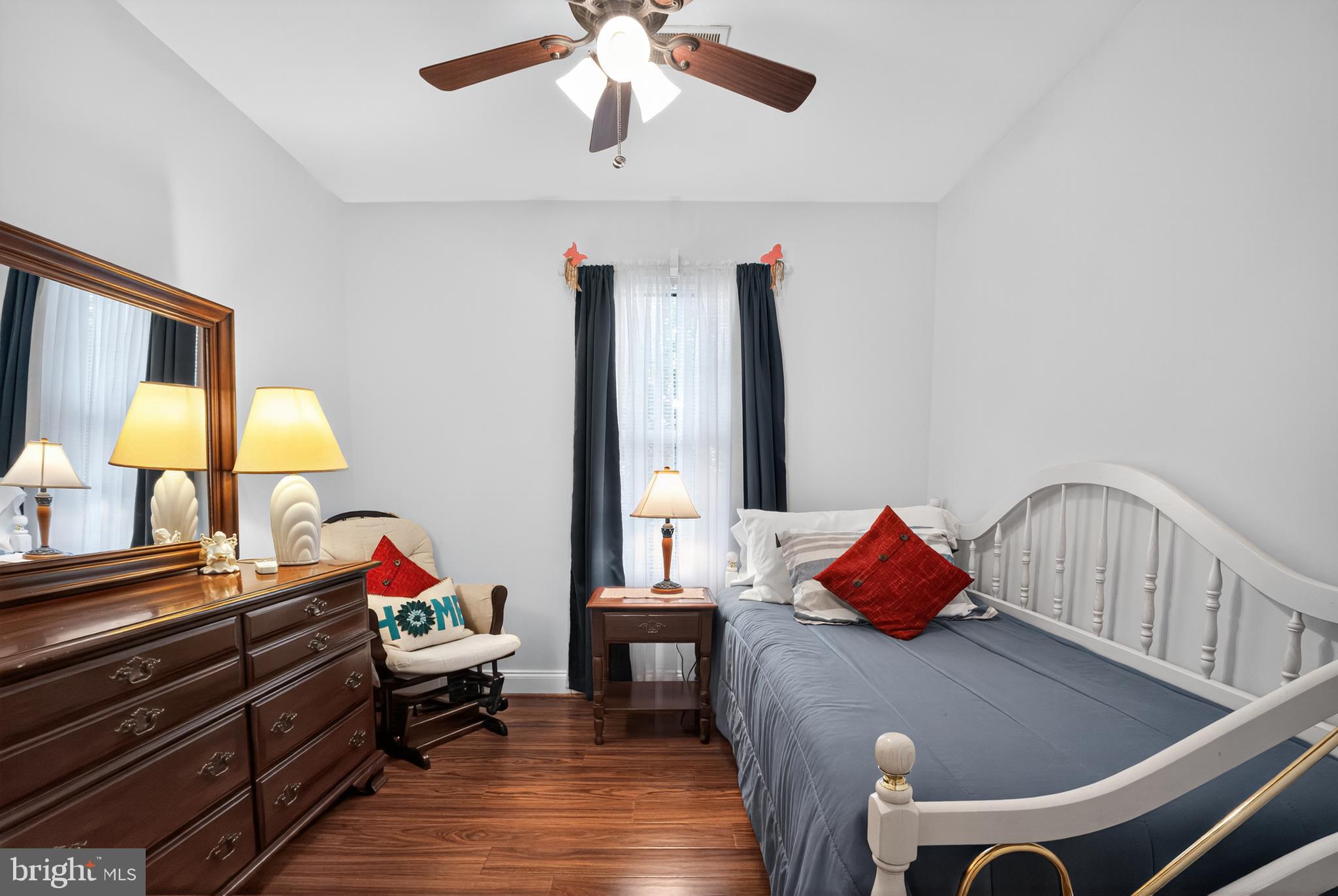 8768 Dunstable Loop Bristow, VA 20136 - Photo 20 of 47 a living room with furniture and a chandelier