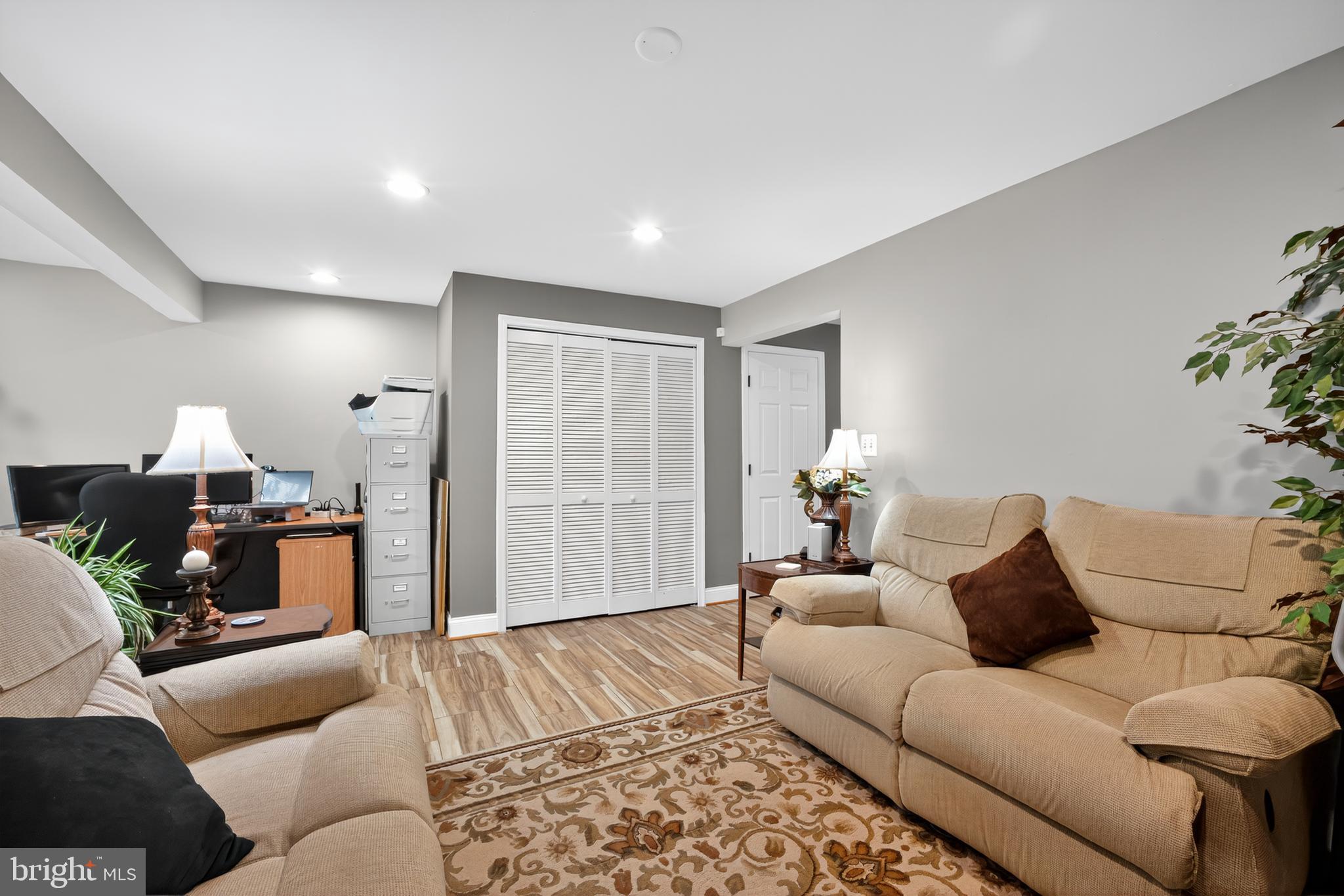 8768 Dunstable Loop Bristow, VA 20136 - Photo 27 of 47 a living room with furniture and a couch