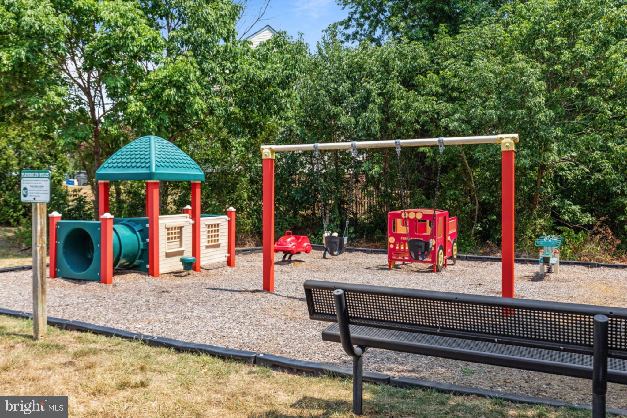 8768 Dunstable Loop Bristow, VA 20136 - Photo 38 of 47 a bench is sitting in the middle of a building