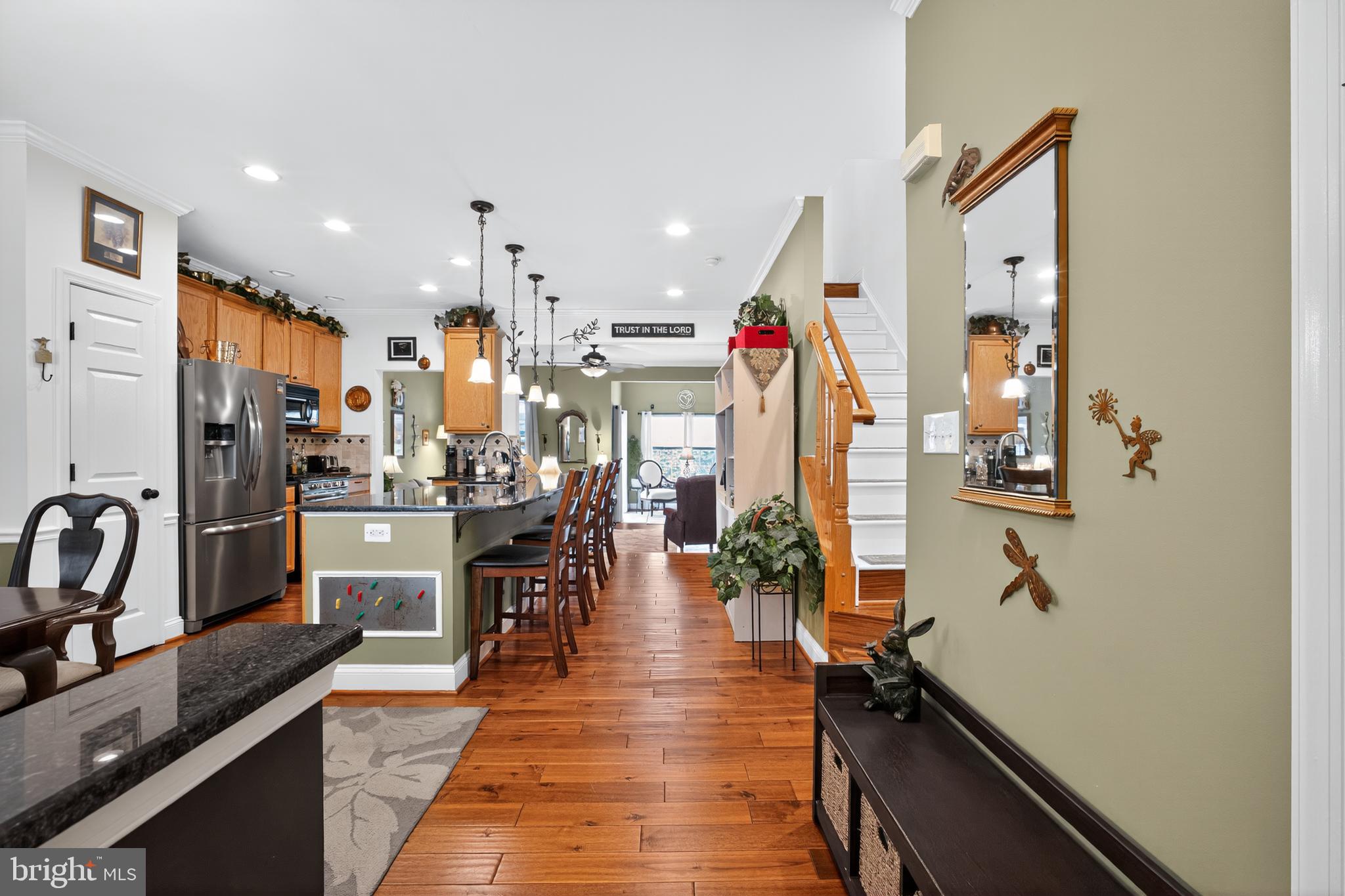 8768 Dunstable Loop Bristow, VA 20136 - Photo 5 of 47 a view of a living room and dining room