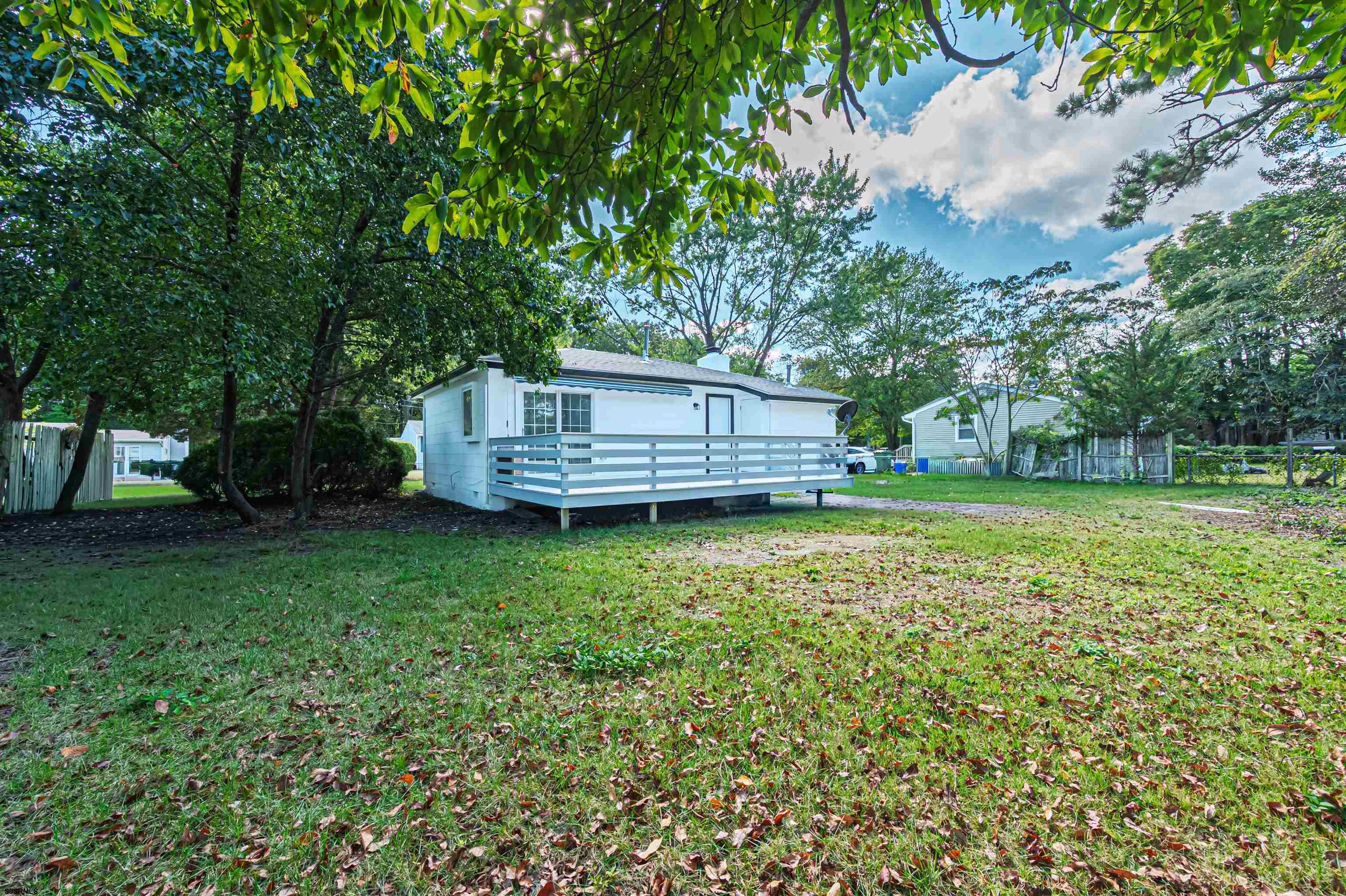 25 Robin Road Egg Harbor Township, NJ 08234 - Photo 21 of 24 a view of a house with a backyard