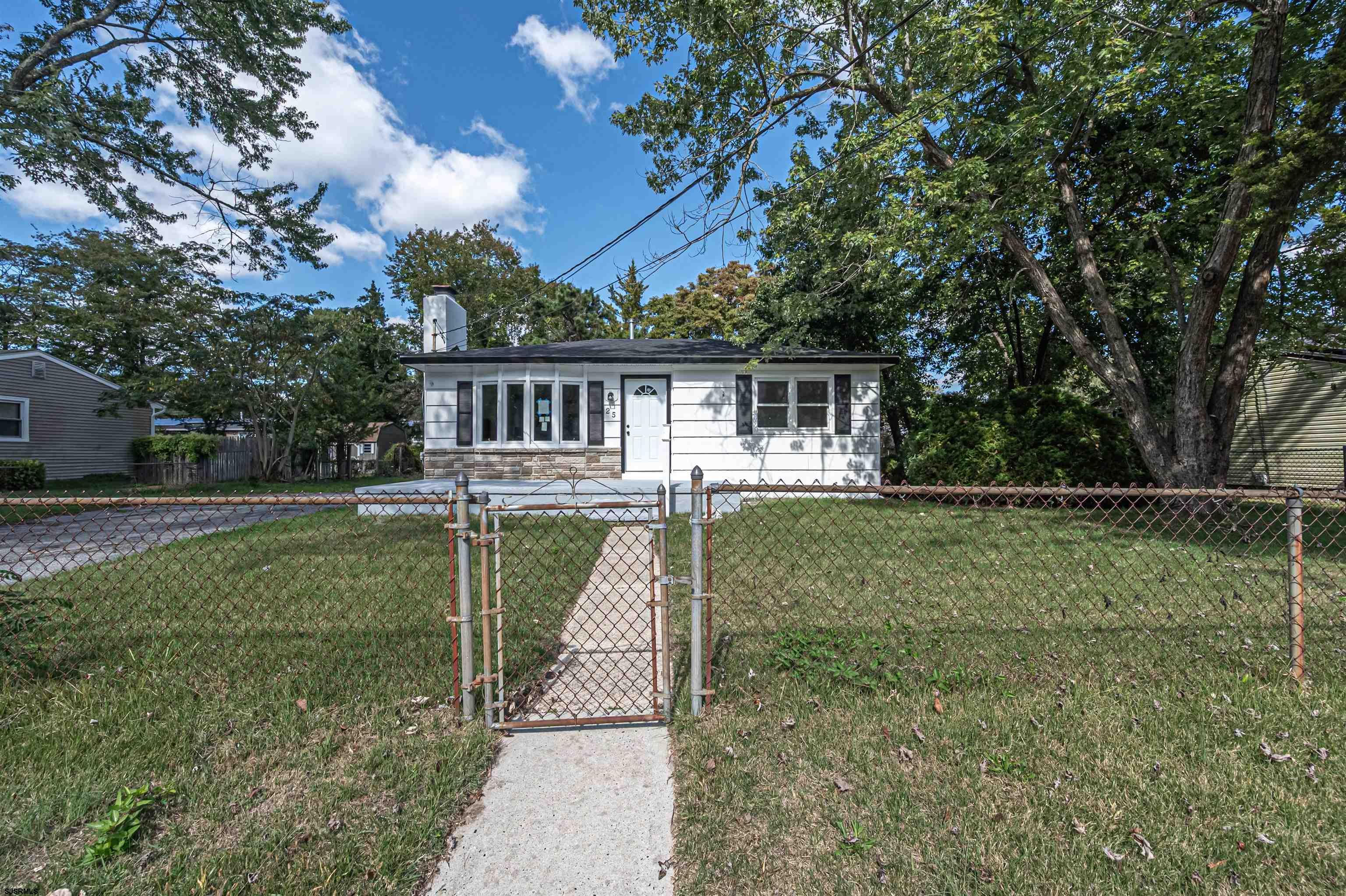 25 Robin Road Egg Harbor Township, NJ 08234 - Photo 22 of 24 a view of a house with a yard