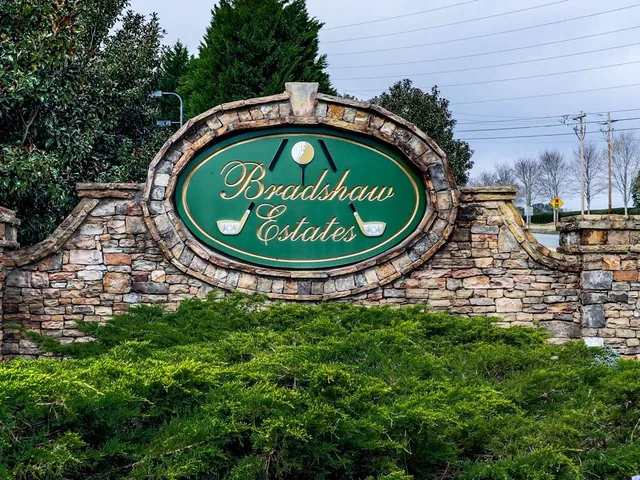 a view of a wooden fence