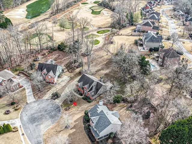 an aerial view of residential house with outdoor space