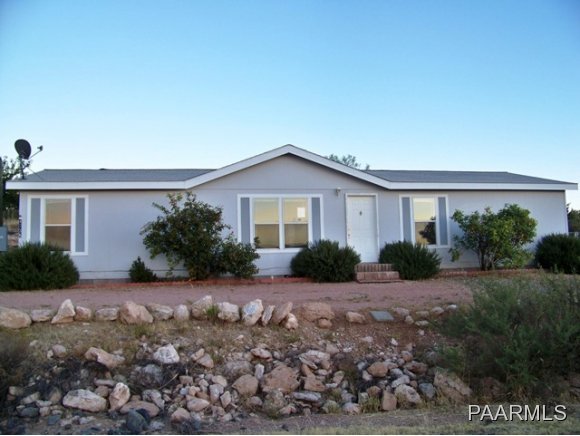 4735 Ho Hum Trail Rimrock, AZ 86335 - Photo 1 of 18 a view of a house with a yard and potted plants