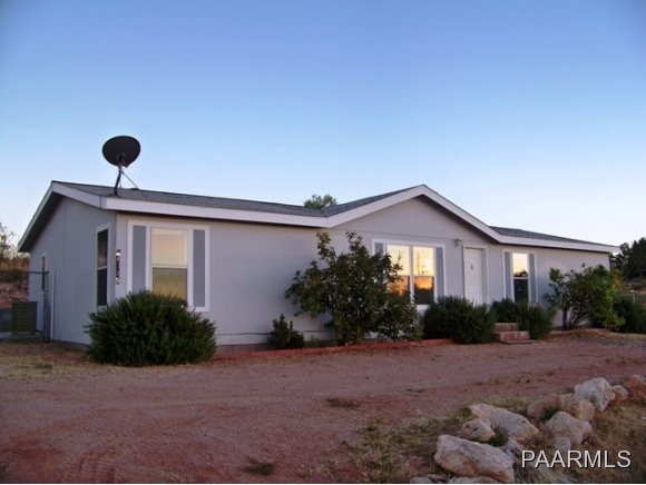 4735 Ho Hum Trail Rimrock, AZ 86335 - Photo 2 of 18 a house view with a backyard space