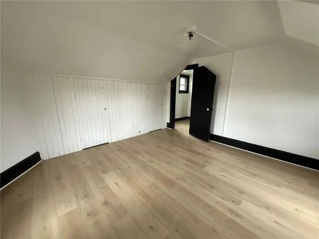 a view of empty room with windows