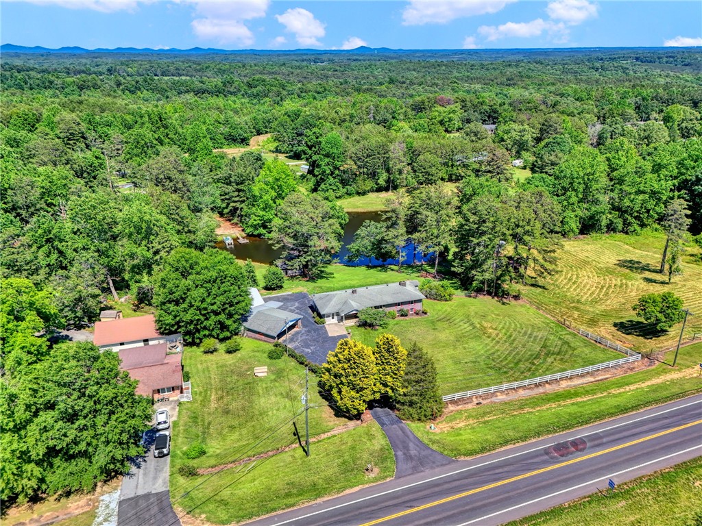 7876 Highway 11 Walhalla, SC 29691 - Photo 34 of 35 Discover a private retreat, featuring a serene pond and expansive acreage, ideal for quiet country living.