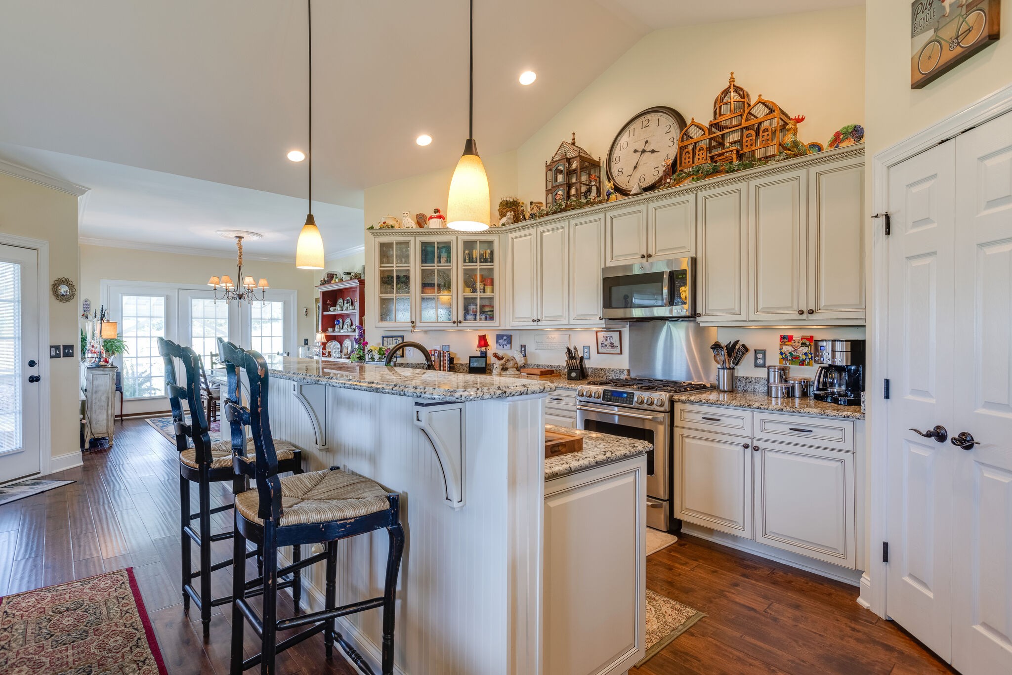 3318 Mahlon Moore Road Spring Hill, TN 37174 - Photo 14 of 49 a kitchen with cabinets and chairs