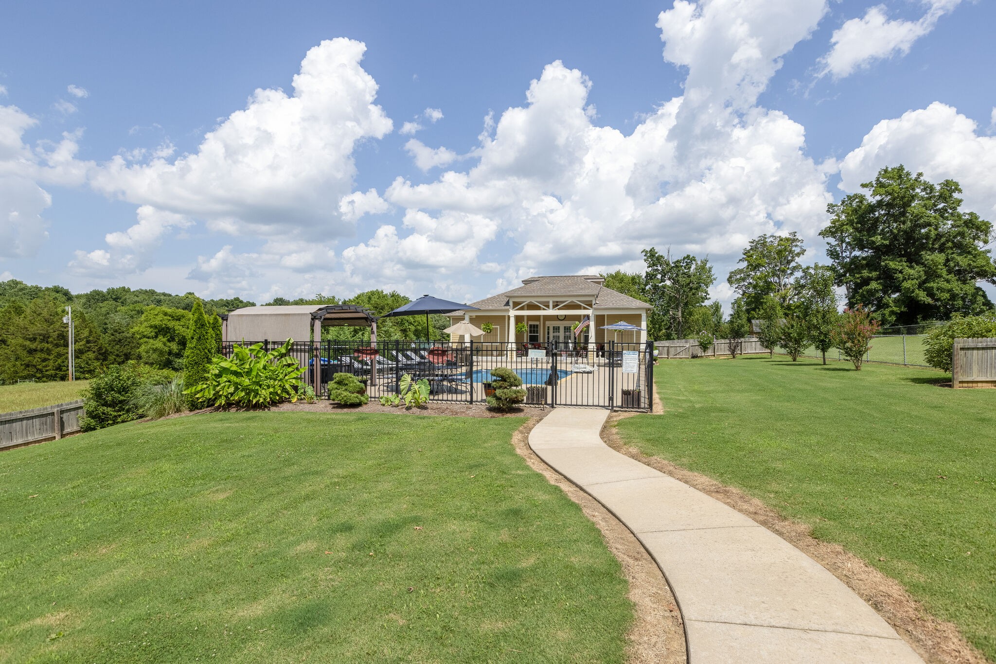 3318 Mahlon Moore Road Spring Hill, TN 37174 - Photo 40 of 49 a front view of a house with garden