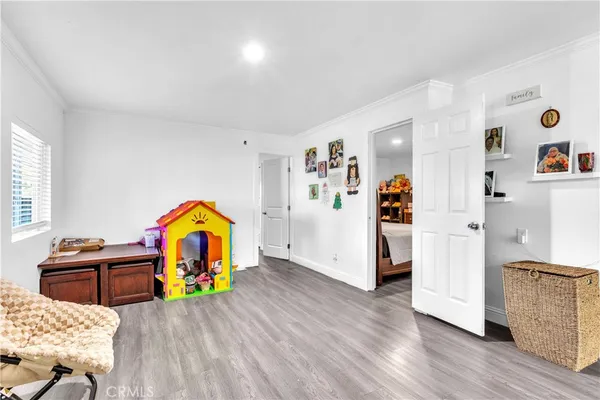 a kitchen with stainless steel appliances granite countertop a refrigerator sink and stove