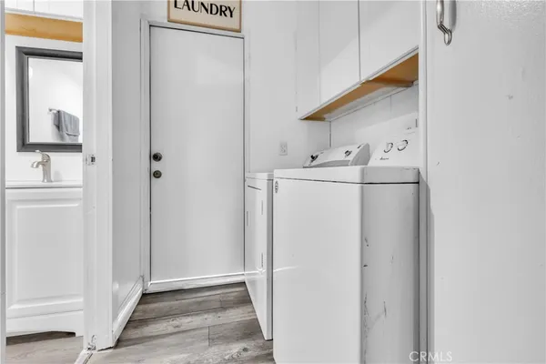 a bedroom with a bed and a cabinets