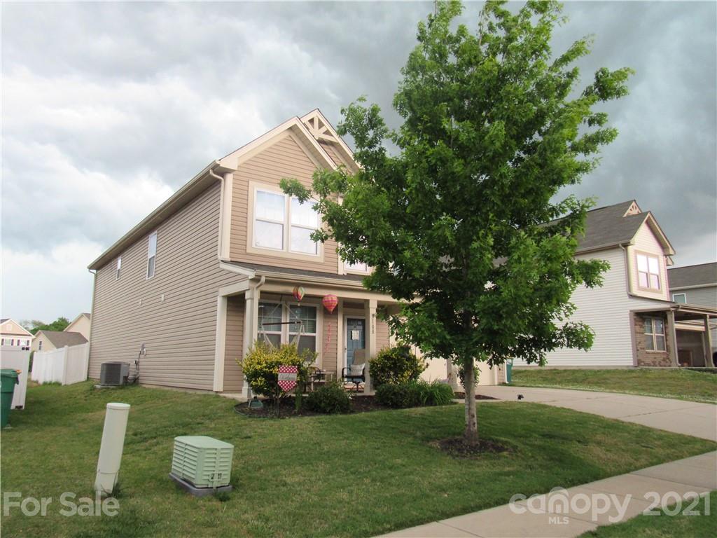 8188 Thornton Street Locust, NC 28097 - Photo 3 of 36 front view of a house with a yard