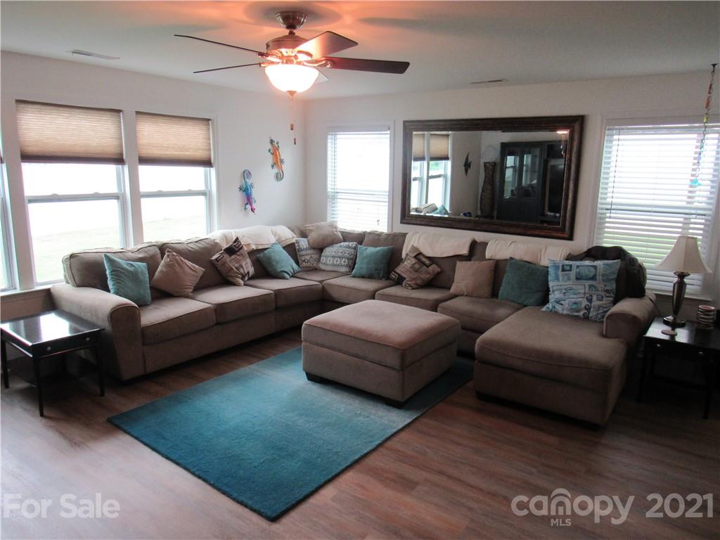 8188 Thornton Street Locust, NC 28097 - Photo 26 of 36 a living room with furniture and a window