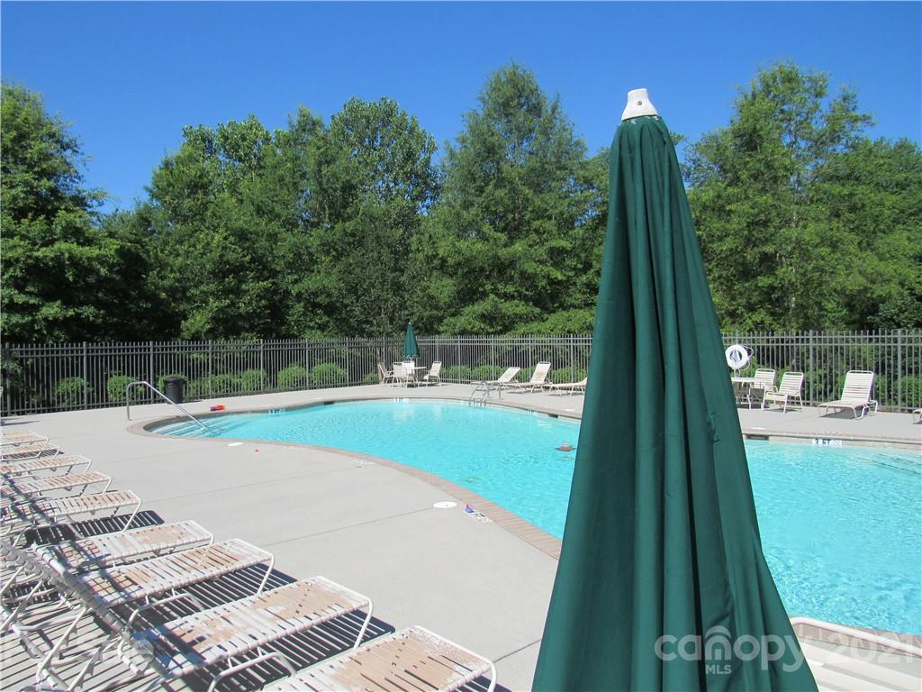 8188 Thornton Street Locust, NC 28097 - Photo 32 of 36 a view of a balcony with yard