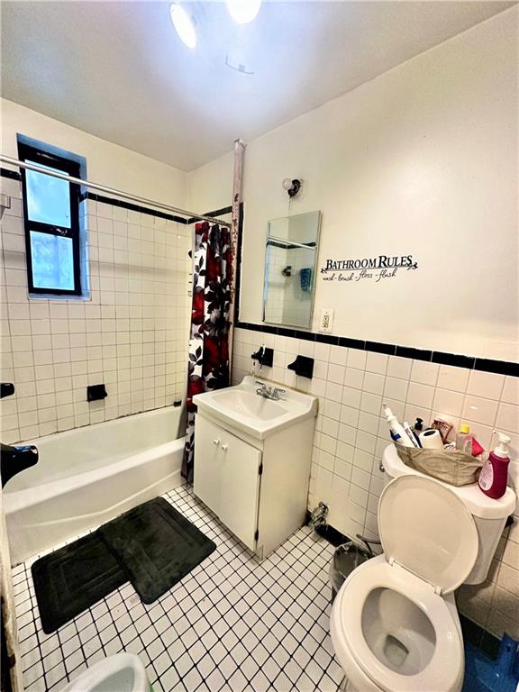 767 Eastern Parkway, Unit 1A Brooklyn, NY 11213 - Photo 12 of 12 a bathroom with a sink a toilet and bathtub