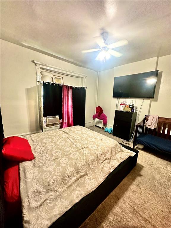 767 Eastern Parkway, Unit 1A Brooklyn, NY 11213 - Photo 6 of 12 a bed room with a bed and a television