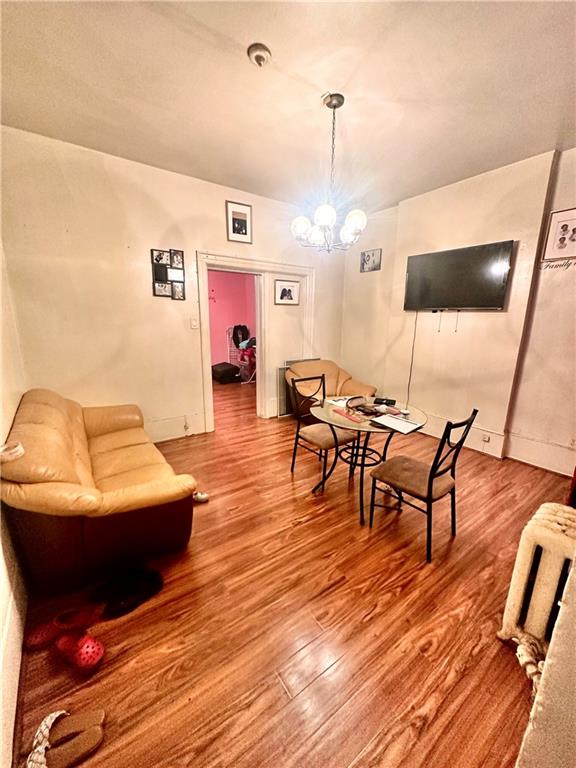 767 Eastern Parkway, Unit 1A Brooklyn, NY 11213 - Photo 7 of 12 a living room with furniture and a wooden floor