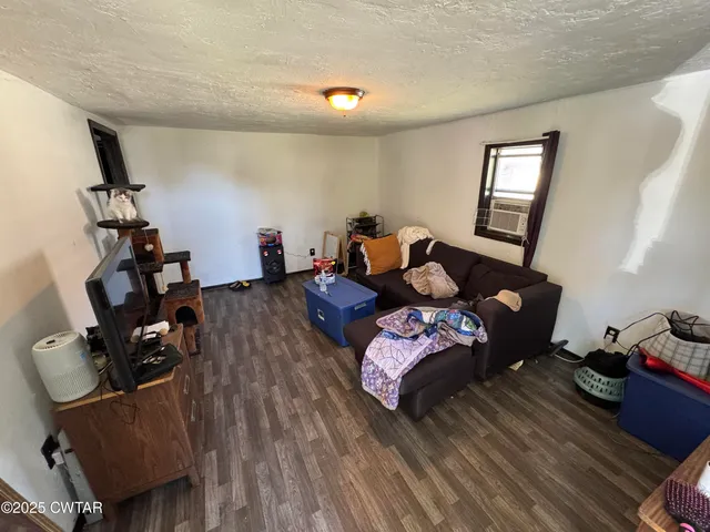 a view of a workspace with furniture