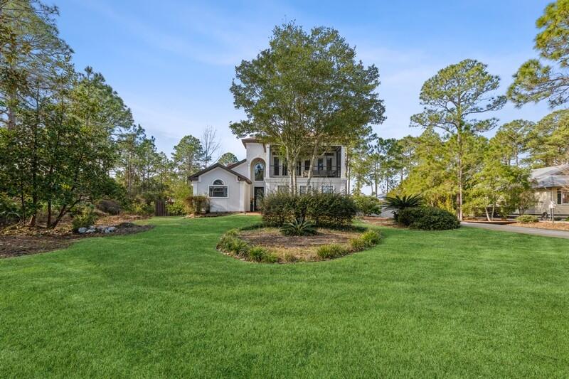 1164 Driftwood Point Road Santa Rosa Beach, FL 32459 - Photo 1 of 39 a view of a house with a yard