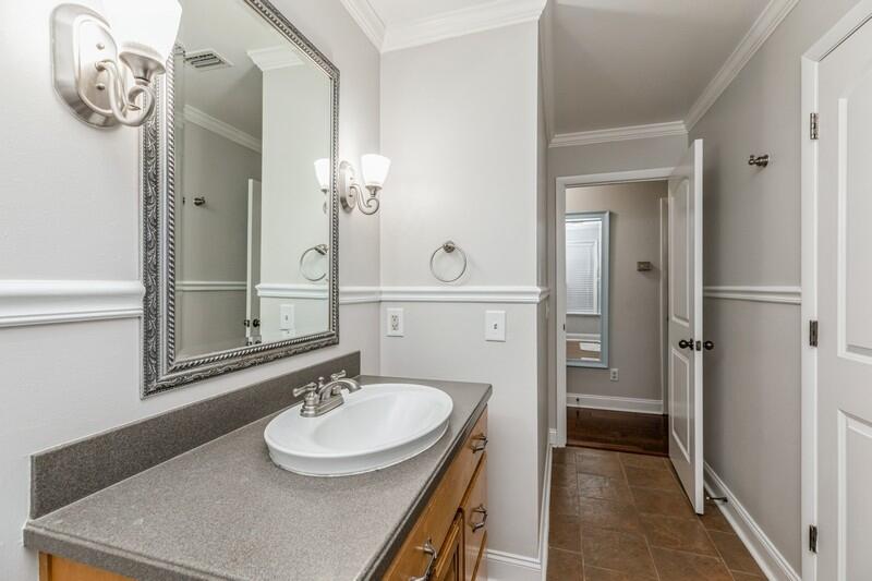 1164 Driftwood Point Road Santa Rosa Beach, FL 32459 - Photo 18 of 39 a bathroom with a sink vanity and a mirror