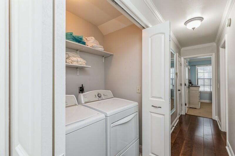 1164 Driftwood Point Road Santa Rosa Beach, FL 32459 - Photo 19 of 39 a view of washer and dryer with wooden floor