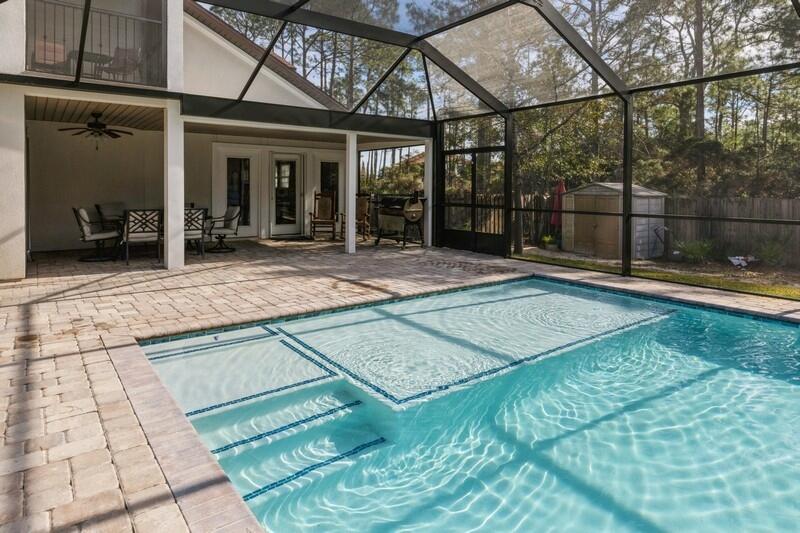 1164 Driftwood Point Road Santa Rosa Beach, FL 32459 - Photo 32 of 39 a view of a house with a backyard