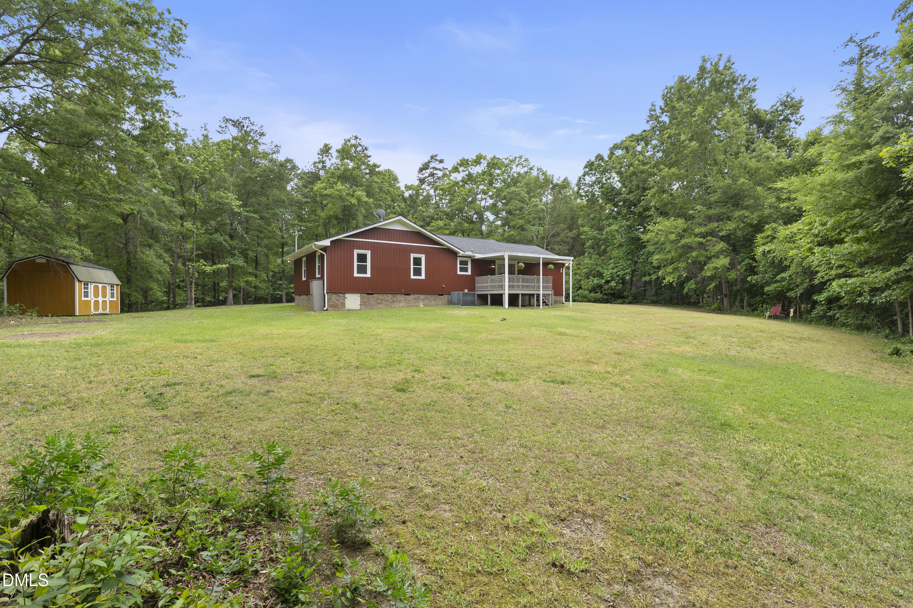 2168 Lakewood Falls Road Goldston, NC 27252 - Photo 25 of 30 a view of a house with a yard