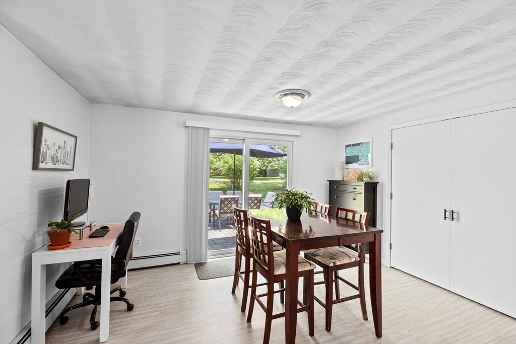 13 Pinewood Drive Framingham, MA 01701 - Photo 11 of 21 a view of a dining room with furniture window and outside view
