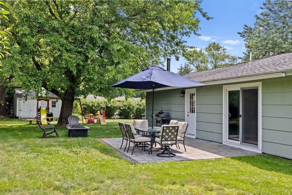 13 Pinewood Drive Framingham, MA 01701 - Photo 20 of 21 a view of a house with backyard porch and sitting area