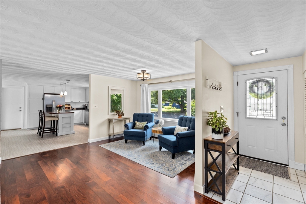 13 Pinewood Drive Framingham, MA 01701 - Photo 6 of 21 a living room with furniture and a window